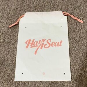 Labubu ‘Have A Seat’ Drawstring Dust Bag